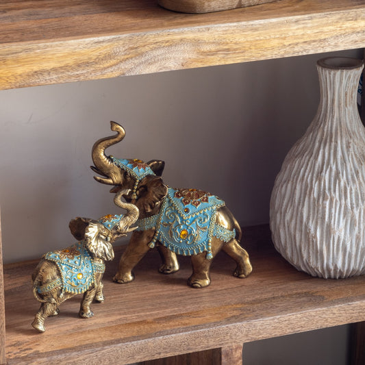 Elefante Dorado Manto Turquesa