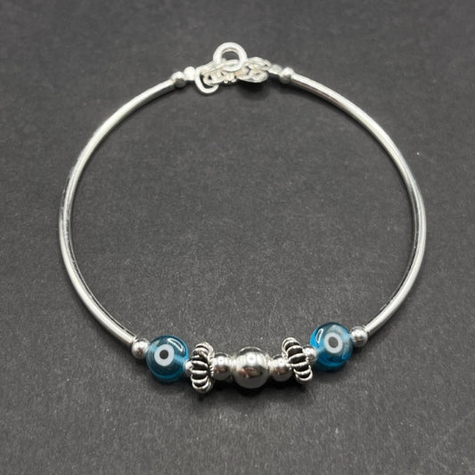 Pulsera Semirrígida Ruedas Ojo